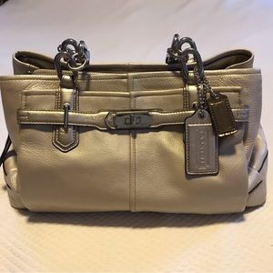 Champagne-colored leather Coach carryall